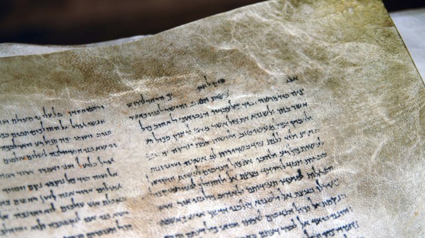 QUMRAN, ISRAEL &#8211; SEP 27 2008:The Dead Sea Scrolls on display at the caves of Qumran.They are a collection of 972 Hebrew Bible texts discovered between 1946-1956 at Khirbet Qumran, Israel.