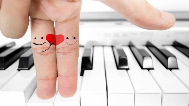 Fingers on a piano heart drawing